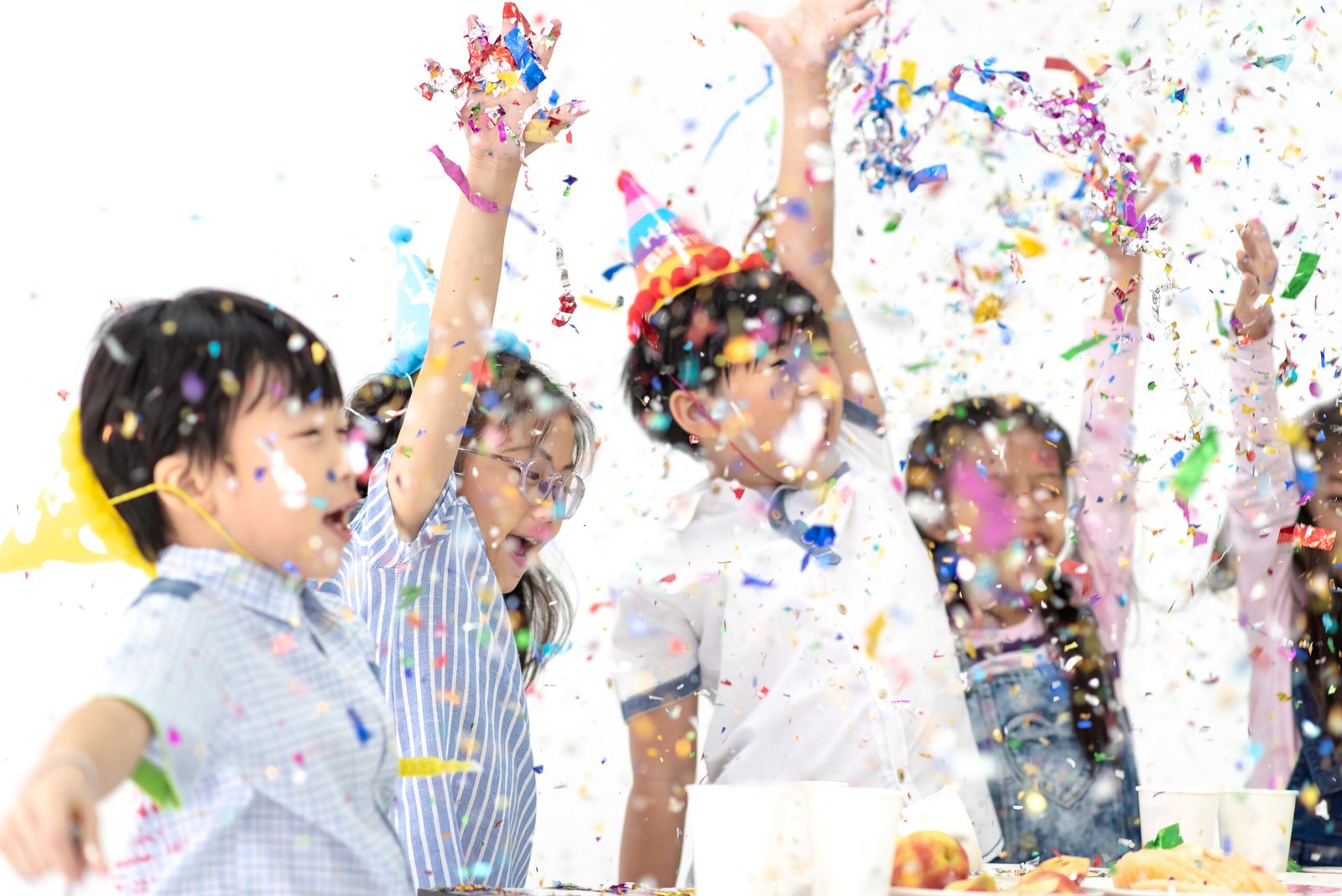 Group of Cheerful Asian Kids Enjoying Party with Friends in Celebrate Event, Happy Children Having Fun with Friends at School in Christmas New Year Party.